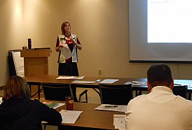 Karen Coutts delivering a Clear Writing seminar, 2013